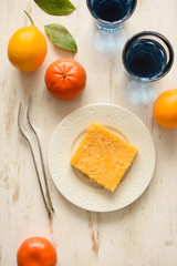 Healthy drinks and desserts. Lemon pie and organic Thai blue tea anchan or Clitoria tea served with fresh fruits on white background