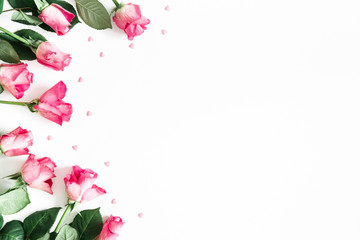 Flowers composition. Pink rose flowers on white background. Flat lay, top view, copy space - obrazy, fototapety, plakaty