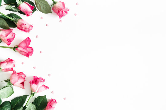 Flowers composition. Pink rose flowers on white background. Flat lay, top view, copy space