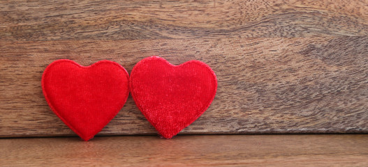 Valentine's Day background with two big red hearts, small hearts and dried roses, mother's day background