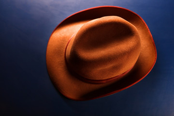 vintage hat blue background 