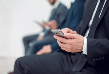 business people using their smartphones