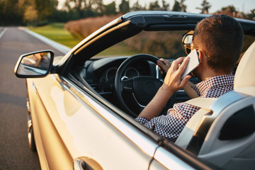 man talking on smartphone