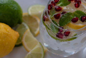 Healthy refreshing citrus and pomegranate sparkling drink.