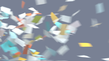 flying sheets of colored paper