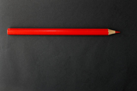 Red pencils isolated on the black background