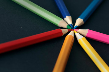 Coloured pencils isolated on the black background