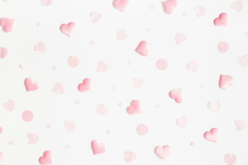 Valentine's Day background. Pink hearts on white background. Valentines day concept. Flat lay, top view