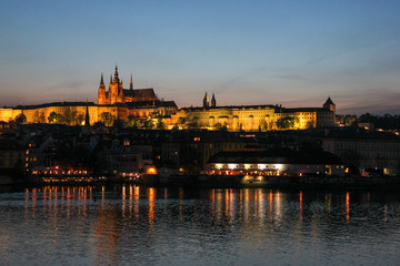 Obraz na płótnie Canvas Scenic evening view on Vltava river, Prague castle and historical center of Prague,buildings and landmarks of old town, Prague, Czech Republic