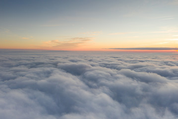 Fototapeta na wymiar Sunset sky from the airplane window