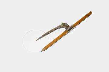 Old metal compass with pencil. Drawing tool. Isolated.