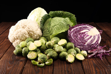 organic cabbage heads. Antioxidant balanced diet eating with red cabbage, white cabbage and savoy....