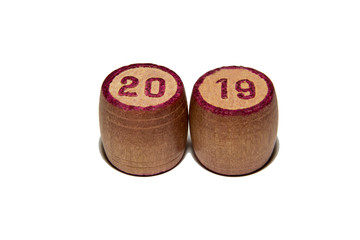 Wooden kegs for a game in a lotto with red numbers. Gambling. Vintage barrels Bingo Board game. Close up. 2019 year.