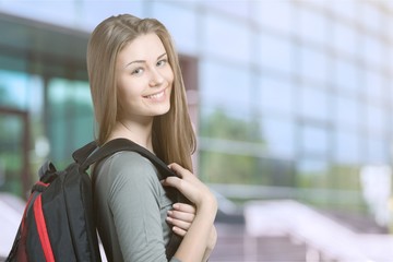 Fototapeta premium Pretty Young female student on background