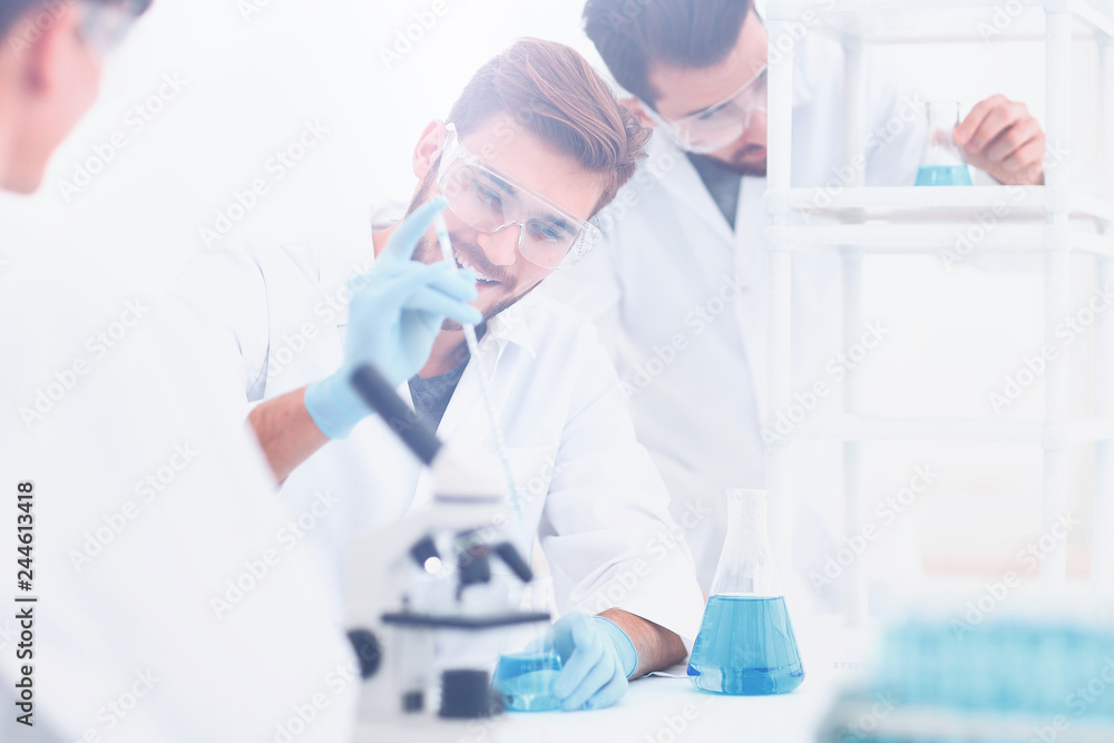Wall mural background image science team in the lab