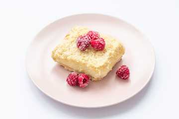 Slice of plain cheesecake. Raspberry cheesecake. 