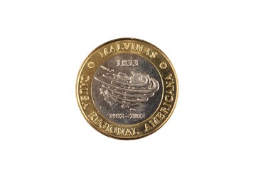 A close up image of a bimettalic Argentinian two peso coin isolated on a white background