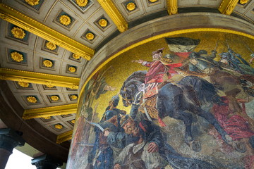 Fototapeta na wymiar Mosaic painting on base of Victory Column in Tiergarten, Berlin, Germany