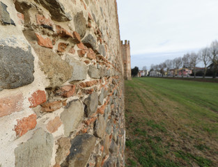 ancient city walls that surrounds the village were built in the eleventh century