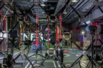 Naklejka premium Modern gym interior with equipment. Sport, fitness and health care concept