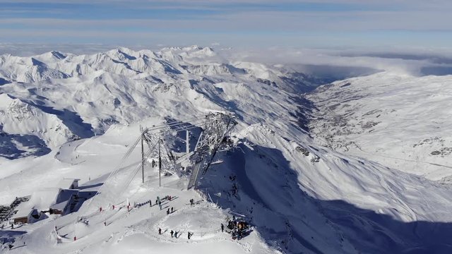 Val Thorens Cime de Caron cable car in the 3 Vallee ski area in vertiginous and steep descent towards the valley