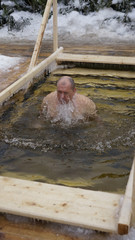 traditional swimming in the ice-hole in the winter on the feast of the baptism of God