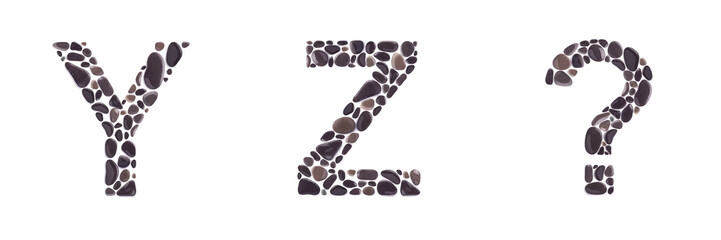 Y and Z letters and question mark made of beach stones isolated on white background