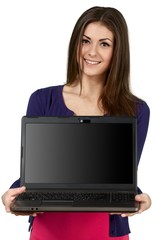 Friendly Young Woman Holding Laptop - Isolated