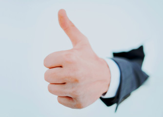close up.businessman showing thumb up