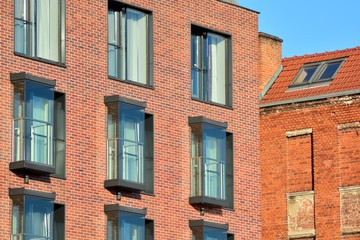Modern apartment buildings on a sunny day with a blue sky. Facade of a modern apartment building