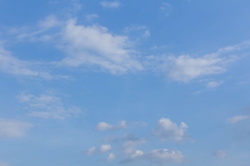 The blue sky and white clouds indicate pure and freshing