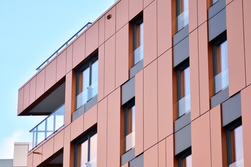Modern apartment buildings on a sunny day with a blue sky. Facade of a modern apartment building