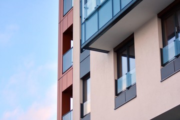 Modern apartment buildings on a sunny day with a blue sky. Facade of a modern apartment building