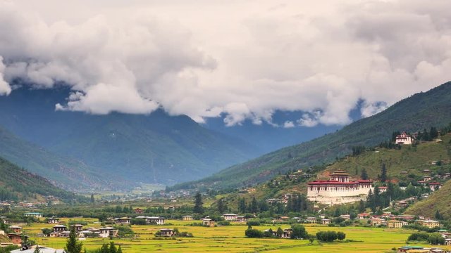 Looking out over the city of Paro in Bhutan. The Rinpung Dzong can be seen. Time Lapse.
