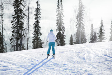 Skier Woman Stock Photo. Skiing, winter fun, sport.