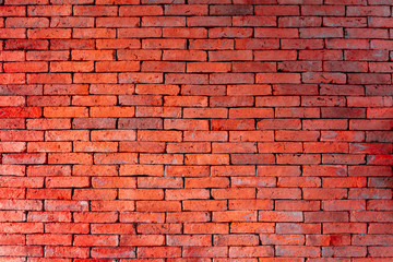 Old red bricks wall background.