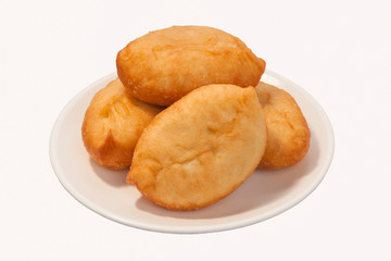 fried pies on a plate