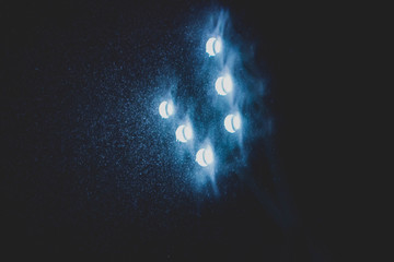 snowy stadium lights