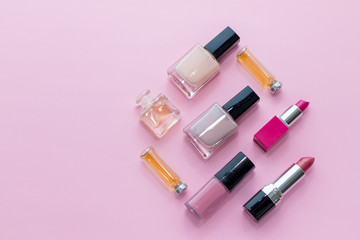 Obraz premium set of professional decorative cosmetics, makeup tools and accessory isolated on pink background. beauty, fashion and shopping concept. flat lay composition, top view.Trendy Design. Creative Pastel