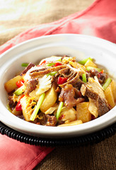 Delicious Chinese food, stir fried beef in pot
