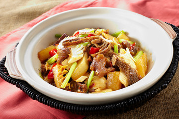 Delicious Chinese food, stir fried beef in pot

