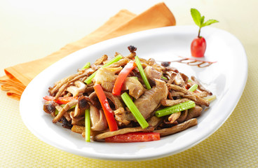 Delicious Chinese food, fried pork tripe with wild mushrooms

