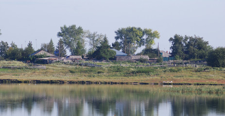 Fototapeta na wymiar View of a remote Siberian village Zuzya