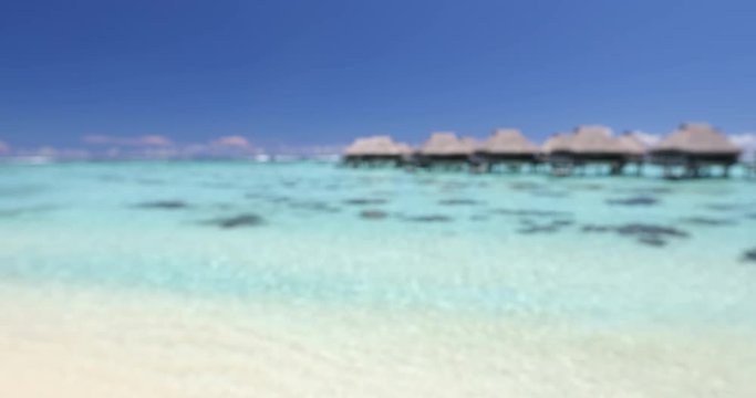 Luxury travel resort beach background. Blurry, out of focus background shot of perfect paradise beach. 59.94 FPS,