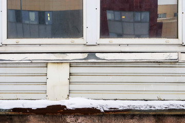 Windows with corrugated metal urban background
