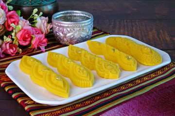 Thai dessert / Royal Thai cuisine : Golden sweetmeat  (Kha nom Thong Ek) , one of famous nine auspicious desserts in Thai tradition, made from yolk, wheat flour and edible gold.