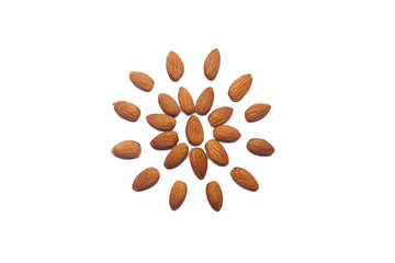 Pattern of Nuts - peeled almonds on a white background in the form of a circle. Concepts about...