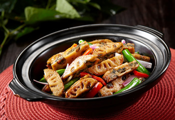 Tasty Chinese cuisine, stewed lotus root with meatloaf in clay pot