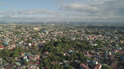 Aerial view of Manila city with skyscrapers and buildings. Philippines, Luzon. Aerial skyline of Manila.