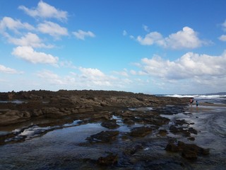 Fototapeta na wymiar rocky shore at beach with tidepools in Isabela, Puerto Rico